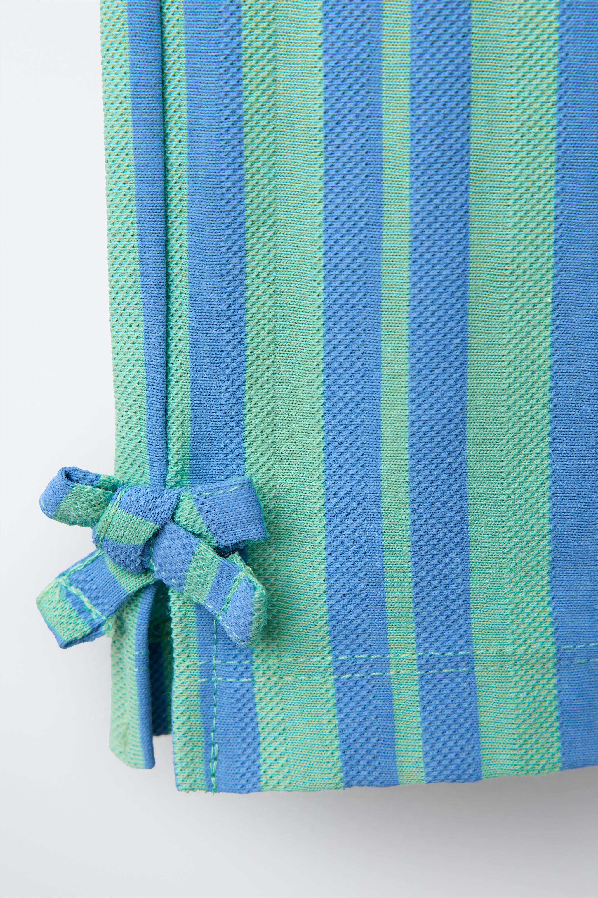 STRIPED PANTS WITH BOWS